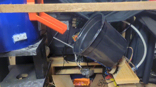 Candy getting dumped from the dropper - another view